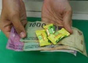 uang receh ganti permen